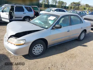 2002 Honda Accord VP z VIN 1HGCF86642A073408, wystawiony jako IAAI lot #42165850 z przebiegiem 71 998 mil mil oraz . Historia ofert i sprzedaży dostępna na DreamBid. Obrazek 2.