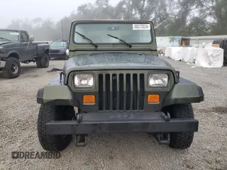 1995 Jeep Wrangler S with VIN 1J4FY19P4SP224403, listed as a Copart auction lot 85573324 with 0 mi miles and Salvage Title. Bid and sale history available at carsss.com. Image 5.