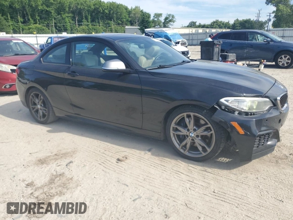 2015 BMW 2 Series M235i with VIN WBA1J7C5XFV253790, listed as a Copart auction lot 57155255 with 136,967 mi miles and Salvage title. Bid and sale history available at DreamBid. Image 4.
