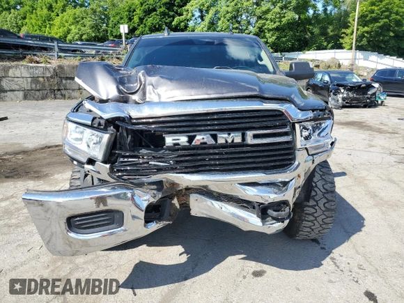 2019 Ram 2500 Big Horn with VIN 3C6UR5JLXKG606957, listed as a Copart auction lot 57713014 with 102,399 mi miles and Salvage Title. Bid and sale history available at carsss.com. Image 5.