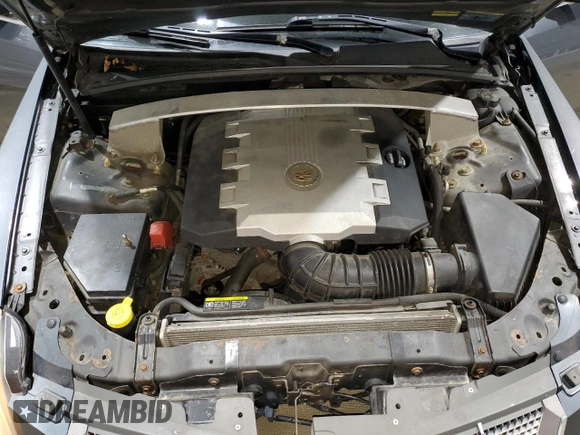 2008 Cadillac CTS AWD z VIN 1G6DG577480197914, wystawiony jako Copart lot #52956555 z przebiegiem 202 753 mil mil oraz Szkoda całkowita • Salvage title. Historia ofert i sprzedaży dostępna na DreamBid. Obrazek 11.