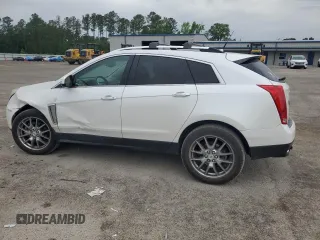 2013 Cadillac SRX Performance Collection z VIN 3GYFNHE33DS602428, wystawiony jako Copart lot #55688555 z przebiegiem 143 504 mil mil oraz Szkody całkowita. Historia ofert i sprzedaży dostępna na DreamBid. Obrazek 2.