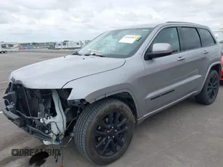 2017 Jeep Grand Cherokee Laredo with VIN 1C4RJFAG1HC701921, listed as a IAAI auction lot 42164963 with 135,039 mi miles and . Bid and sale history available at DreamBid. Image 21.