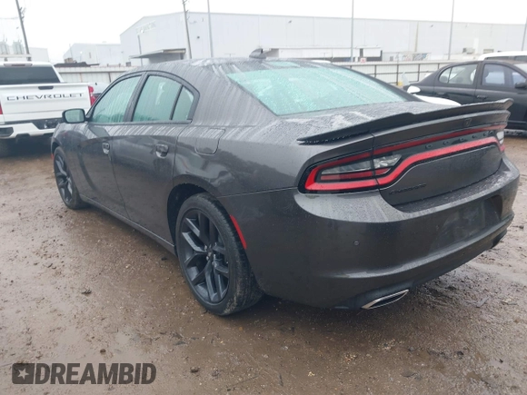 2023 Dodge Charger SXT with VIN 2C3CDXBG8PH566020, listed as a IAAI auction lot 41433879 with 22,187 mi miles and . Bid and sale history available at DreamBid. Image 3.
