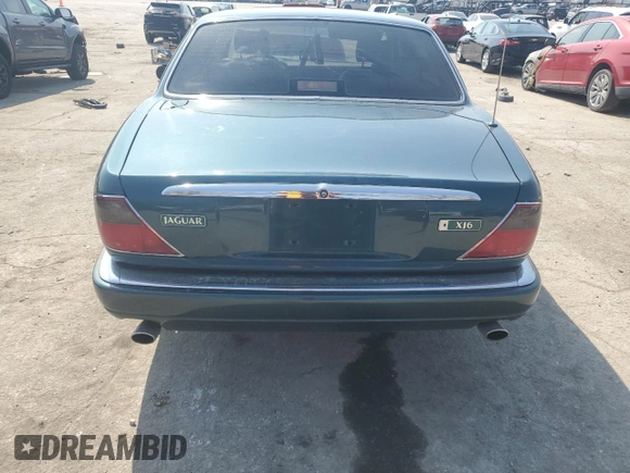 1996 Jaguar XJ z VIN SAJHX1746TC756451, wystawiony jako Copart lot #48991655 z przebiegiem 115 015 mil mil oraz Szkoda całkowita • Salvage title. Historia ofert i sprzedaży dostępna na DreamBid. Obrazek 6.