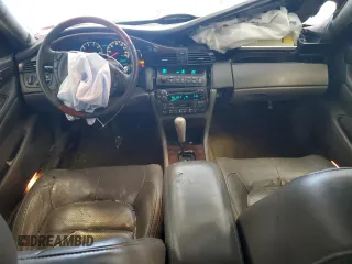 2002 Cadillac DeVille DTS with VIN 1G6KF57912U199809, listed as a Copart auction lot 87372504 with 154,663 mi miles and Salvage Title. Bid and sale history available at carsss.com. Image 8.