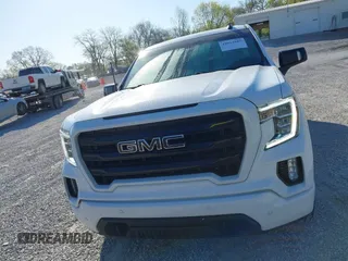 2021 GMC Sierra 1500 Elevation z VIN 3GTU9CED7MG289092, wystawiony jako IAAI lot #42013585 z przebiegiem 64 563 mil mil oraz . Historia ofert i sprzedaży dostępna na DreamBid. Obrazek 6.