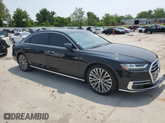 2019 Audi A8 with VIN WAU8DAF82KN020487, listed as a Copart auction lot 60214005 with 75,895 mi miles and Salvage title. Bid and sale history available at DreamBid. Image 4.