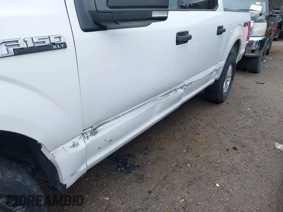 2018 Ford F-150 XL with VIN 1FTEW1E59JKD10992, listed as a IAAI auction lot 42362936 with 225,967 mi miles and . Bid and sale history available at DreamBid. Image 12.