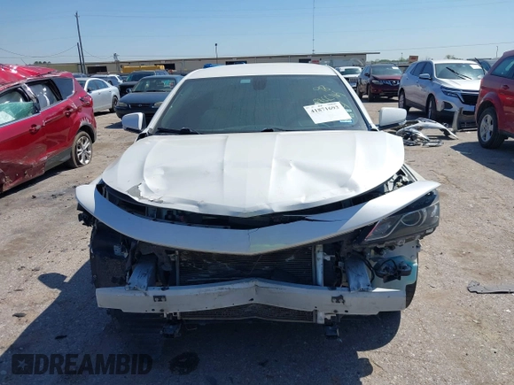 2018 Chevrolet Impala LT with VIN 1G1105S34JU106107, listed as a IAAI auction lot 41871693 with 111,412 mi miles and . Bid and sale history available at DreamBid. Image 6.