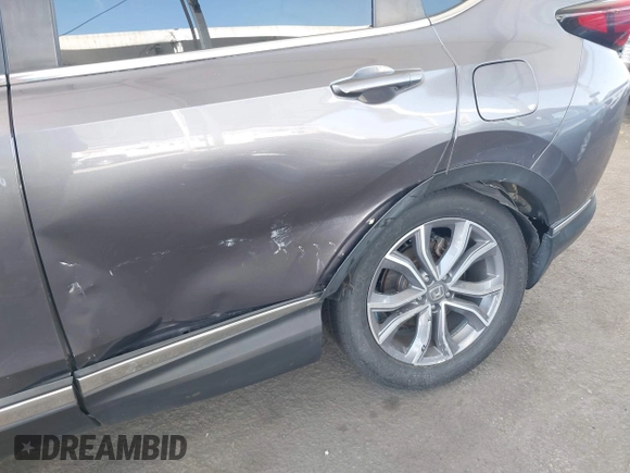 2020 Honda CR-V Touring z VIN 7FART6H91LE000684, wystawiony jako IAAI lot #42504731 z przebiegiem 49 100 mil mil oraz . Historia ofert i sprzedaży dostępna na DreamBid. Obrazek 6.