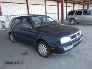 1997 Volkswagen Golf z VIN 3VWFA81H3VM089008, wystawiony jako IAAI lot #41821504 z przebiegiem 118 715 mil mil oraz . Historia ofert i sprzedaży dostępna na DreamBid. Obrazek 1.