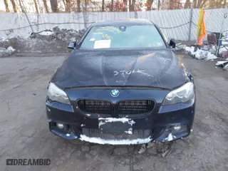 2015 BMW 5 Series 535i xDrive with VIN WBA5B3C55FD548566, listed as a IAAI auction lot 38795042 with 67,985 mi miles. Bid and sale history available at carsss.com. Image 6.