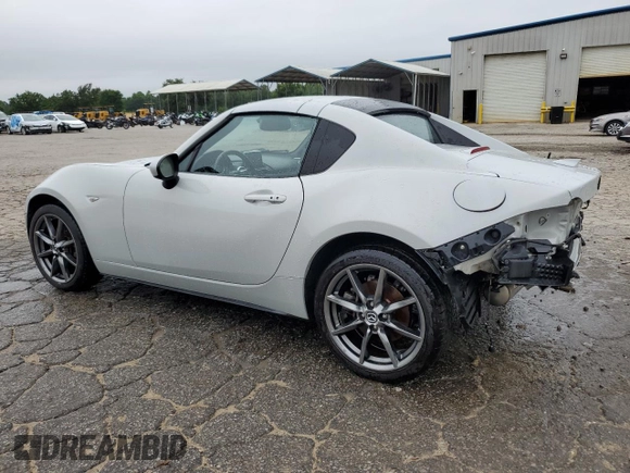 2017 Mazda MX-5 Miata Grand Touring z VIN JM1NDAM70H0104393, wystawiony jako Copart lot #58081805 z przebiegiem 76 279 mil mil oraz Szkoda całkowita • Salvage title. Historia ofert i sprzedaży dostępna na DreamBid. Obrazek 2.