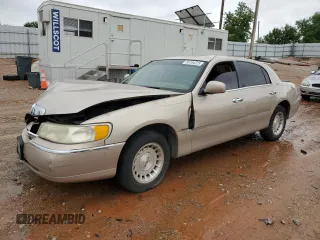 1998 Lincoln Town Car Executive with VIN 1LNFM81W3WY663309, listed as a Copart auction lot 55764225 with Not provided miles and Salvage title. Bid and sale history available at DreamBid. Image 1.