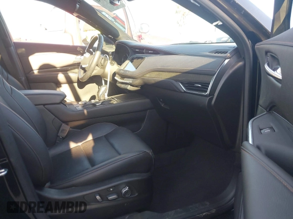 2019 Cadillac XT4 FWD Sport z VIN 1GYFZER43KF183181, wystawiony jako IAAI lot #41869141 z przebiegiem 25 539 mil mil oraz . Historia ofert i sprzedaży dostępna na DreamBid. Obrazek 5.