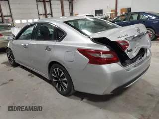 2018 Nissan Altima SR with VIN 1N4AL3AP0JC266584, listed as a IAAI auction lot 41900484 with 136,223 mi miles and . Bid and sale history available at carsss.com. Image 3.