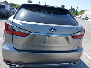 2022 Lexus RX with VIN 2T2AZMAAXNC228573, listed as a IAAI auction lot 41976051 with 22,784 mi miles. Bid and sale history available at carsss.com. Image 16.