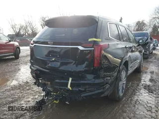 2025 Cadillac XT6 FWD Premium Luxury with VIN 1GYKPCRS6SZ104902, listed as a IAAI auction lot 41565224 with 4,735 mi miles. Bid and sale history available at carsss.com. Image 17.