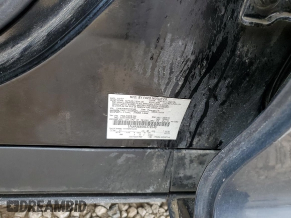 2017 Ford Taurus SEL with VIN 1FAHP2E84HG118540, listed as a Copart auction lot 61239644 with 93,596 mi miles and Salvage Title. Bid and sale history available at DreamBid. Image 14.