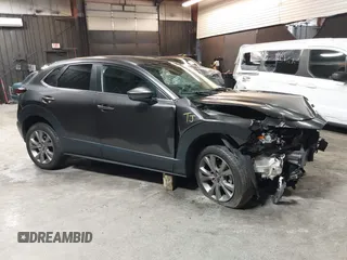 2021 Mazda CX-30 Preferred with VIN 3MVDMBCL1MM247701, listed as a IAAI auction lot 42299009 with 15,880 mi miles and . Bid and sale history available at DreamBid. Image 14.