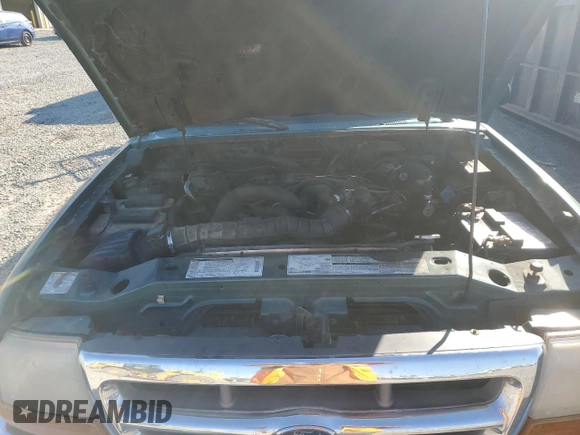 1998 Ford Ranger XL with VIN 1FTYR14U6WPA97765, listed as a Copart auction lot 48428105 with 253,932 mi miles and Salvage title. Bid and sale history available at DreamBid. Image 11.
