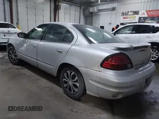 2005 Pontiac Grand Am SE with VIN 1G2NE52E25M168028, listed as a IAAI auction lot 41457663 with 174,933 mi miles. Bid and sale history available at carsss.com. Image 3.