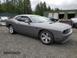 2012 Dodge Challenger SXT Plus z VIN 2C3CDYAG1CH254512, wystawiony jako Copart lot #59034895 z przebiegiem 152 597 mil mil oraz Szkoda całkowita • Salvage title. Historia ofert i sprzedaży dostępna na DreamBid. Obrazek 4.