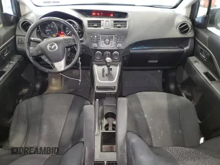2012 Mazda 5 Touring with VIN JM1CW2CL0C0105090, listed as a Copart auction lot 74963864 with 88,759 mi miles and Salvage Title. Bid and sale history available at DreamBid. Image 8.