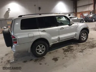 2002 Mitsubishi Montero LTD with VIN JA4MW51R02J016667, listed as a IAAI auction lot 41267504 with 167,446 mi miles. Bid and sale history available at carsss.com. Image 4.