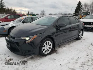 2021 Toyota Corolla L with VIN 5YFBPMBE3MP267133, listed as a Copart auction lot 89284135 with 59,498 mi miles and Salvage Title. Bid and sale history available at carsss.com. Image 1.