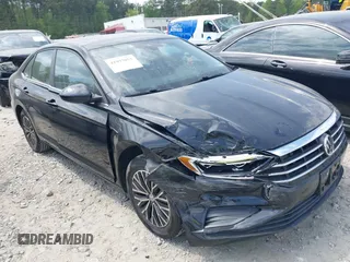 2019 Volkswagen Jetta SEL z VIN 3VWE57BU8KM072660, wystawiony jako IAAI lot #41997053 z przebiegiem 52 482 mil mil oraz . Historia ofert i sprzedaży dostępna na DreamBid. Obrazek 1.