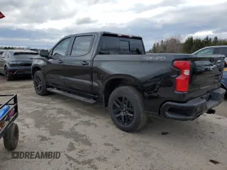 2025 Chevrolet Silverado 1500 with VIN 1GCUKEE86SZ159322, listed as a Copart auction lot 52690435 with 4,975 mi miles and Salvage Title. Bid and sale history available at DreamBid. Image 2.