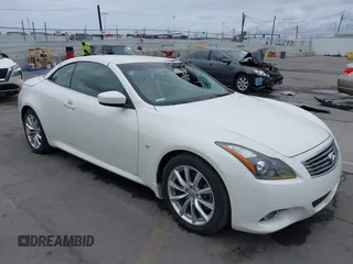 2015 Infiniti Q60 with VIN JN1CV6FE7FM810573, listed as a IAAI auction lot 42071963 with 13,412 mi miles and . Bid and sale history available at DreamBid. Image 1.