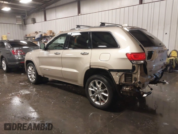 2015 Jeep Grand Cherokee Summit with VIN 1C4RJFJG5FC918837, listed as a IAAI auction lot 41126436 with 155,516 mi miles. Bid and sale history available at carsss.com. Image 3.