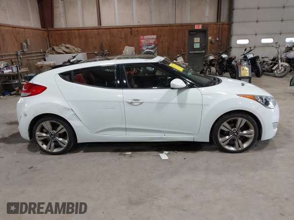 2012 Hyundai Veloster w/Black Int with VIN KMHTC6AD3CU080878, listed as a IAAI auction lot 42377636 with 152,430 mi miles and . Bid and sale history available at DreamBid. Image 13.