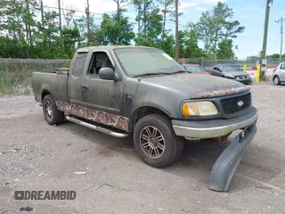 2001 Ford F-150 XL z VIN 1FTRX17L21NA34986, wystawiony jako IAAI lot #42334380 z przebiegiem Nie podano mil oraz . Historia ofert i sprzedaży dostępna na DreamBid. Obrazek 1.