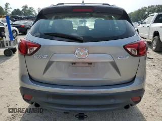 2015 Mazda CX-5 Sport with VIN JM3KE2BE4F0533273, listed as a Copart auction lot 60307795 with 120,484 mi miles and Salvage title. Bid and sale history available at DreamBid. Image 6.
