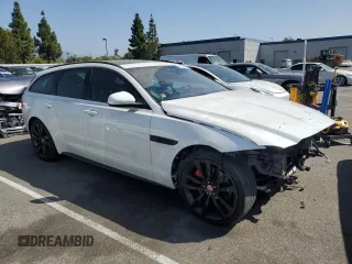 2018 Jaguar XF with VIN SAJBM2FV5JCY68282, listed as a Copart auction lot 71330564 with 53,741 mi miles and Salvage Title. Bid and sale history available at DreamBid. Image 4.