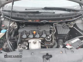 2006 Honda Civic LX with VIN 2HGFA16556H520894, listed as a IAAI auction lot 41963736 with 166,682 mi miles and . Bid and sale history available at DreamBid. Image 10.