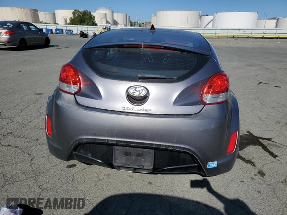 2012 Hyundai Veloster w/Gray Int z VIN KMHTC6AD9CU079542, wystawiony jako Copart lot #55998045 z przebiegiem 98 065 mil mil oraz Szkoda całkowita • Salvage title. Historia ofert i sprzedaży dostępna na DreamBid. Obrazek 6.