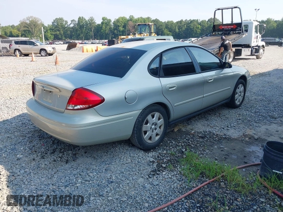 2005 Ford Taurus SE with VIN 1FAFP53205A131307, listed as a IAAI auction lot 42678385 with 198,491 mi miles and . Bid and sale history available at DreamBid. Image 4.