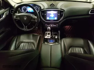 2016 Maserati Ghibli S Q4 with VIN ZAM57RTA3G1171304, listed as a Copart auction lot 69976983 with 97,099 mi miles. Bid and sale history available at carsss.com. Image 8.