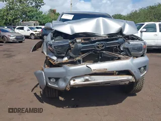 2014 Toyota Tacoma with VIN 3TMLU4EN3EM159080, listed as a IAAI auction lot 41809259 with 113,950 mi miles and . Bid and sale history available at DreamBid. Image 6.