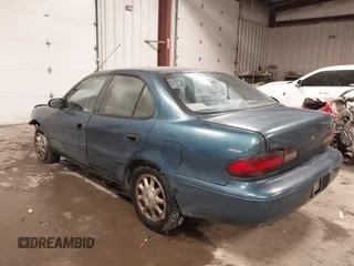 1994 Geo Prizm z VIN 1Y1SK5380RZ081863, wystawiony jako IAAI lot #41489263 z przebiegiem 124 256 mil mil oraz . Historia ofert i sprzedaży dostępna na DreamBid. Obrazek 3.
