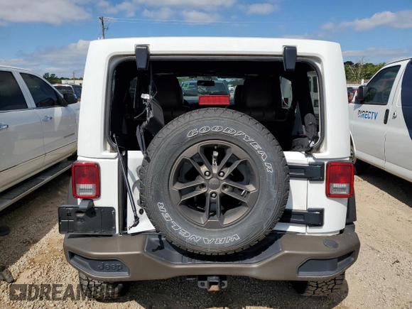 2016 Jeep Wrangler Unlimited Sahara with VIN 1C4BJWEG1GL328101, listed as a Copart auction lot 52754865 with 65,106 mi miles and Salvage title. Bid and sale history available at DreamBid. Image 6.