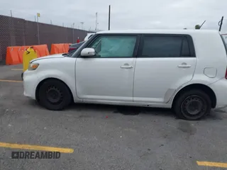 2014 Scion xB with VIN JTLZE4FEXEJ054060, listed as a IAAI auction lot 42096159 with 211,994 mi miles. Bid and sale history available at carsss.com. Image 14.
