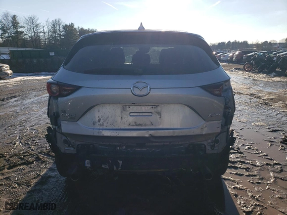2018 Mazda CX-5 Touring with VIN JM3KFBCM9J0343240, listed as a Copart auction lot 88751245 with 132,038 mi miles and Salvage Title. Bid and sale history available at carsss.com. Image 6.