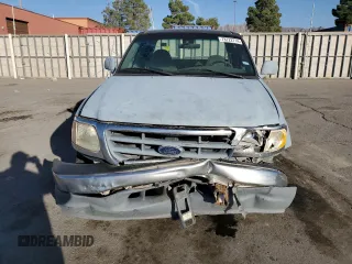 2000 Ford F-150 XL with VIN 1FTZX0723YKA02769, listed as a Copart auction lot 78722714 with 354,312 mi miles and Salvage title. Bid and sale history available at DreamBid. Image 5.