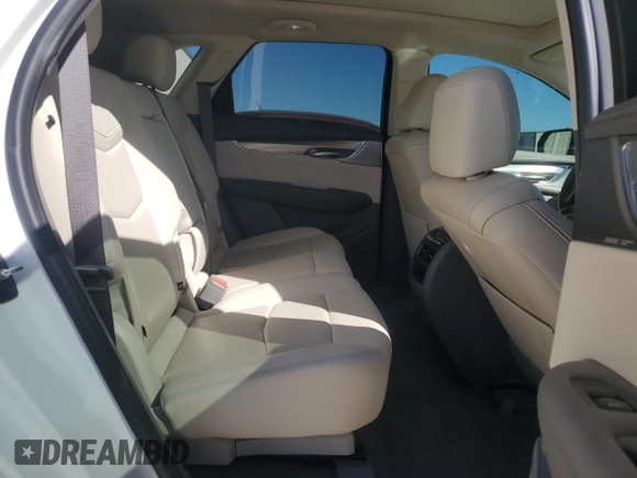 2021 Cadillac XT5 FWD Premium Luxury with VIN 1GYKNCRSXMZ135949, listed as a Copart auction lot 47752805 with 99,838 mi miles and Salvage Title. Bid and sale history available at carsss.com. Image 12.